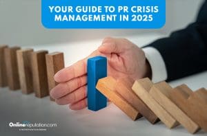 A hand stops falling wooden dominoes with a blue block, symbolizing effective PR crisis management. Above, text reads "Your Guide to PR Crisis Management in 2025." The OnlineReputation.com logo appears in the lower left corner.