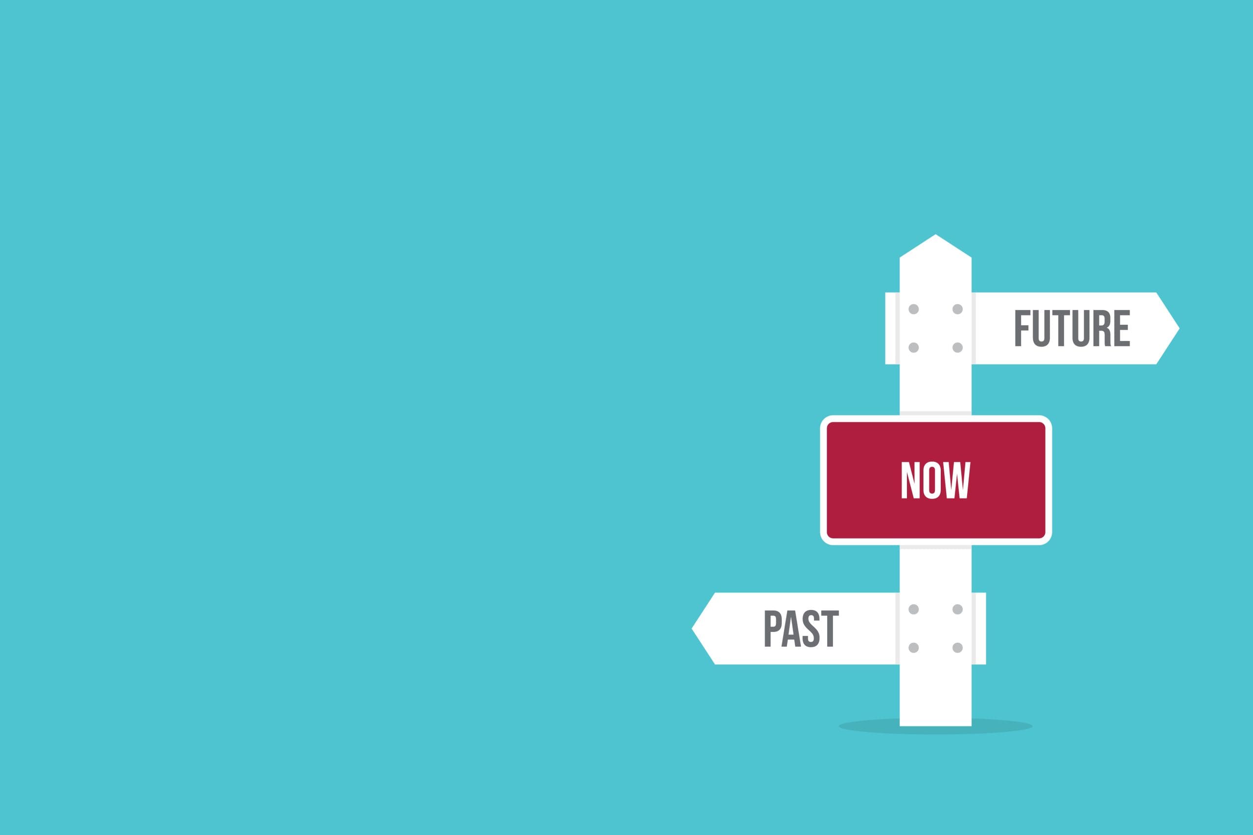 A signpost with arrows pointing left to "PAST," right to "FUTURE," and a red sign in the center reading "NOW," set against a plain blue background.