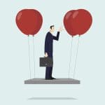 A man in a business suit stands on a floating platform held up by red balloons, holding a briefcase and pinching his nose as if to hold his breath. The background is light blue and minimalistic.