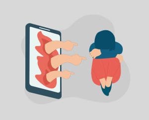 A person sits on the ground hugging their knees, looking upset, while several hands emerge from a smartphone screen, pointing at them accusingly.