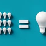 Nine small white light bulbs on the left and one large white light bulb on the right, separated by an equals sign, on a blue background.