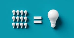 Nine small white light bulbs on the left and one large white light bulb on the right, separated by an equals sign, on a blue background.
